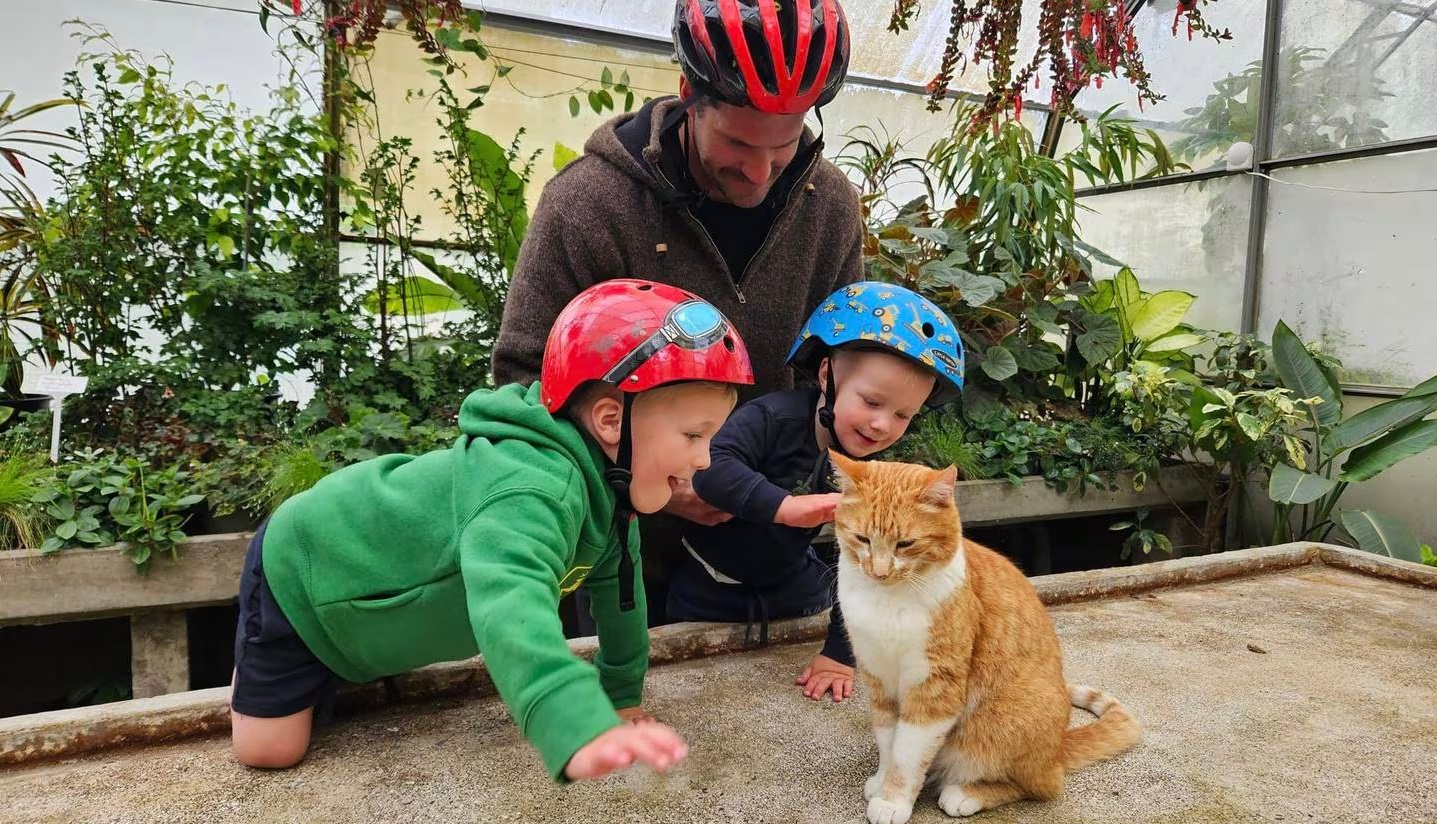 Ari, Ben and Lochie Jagger with Junior in Queens Park's winter gardens. Photo: Johannah Jagger