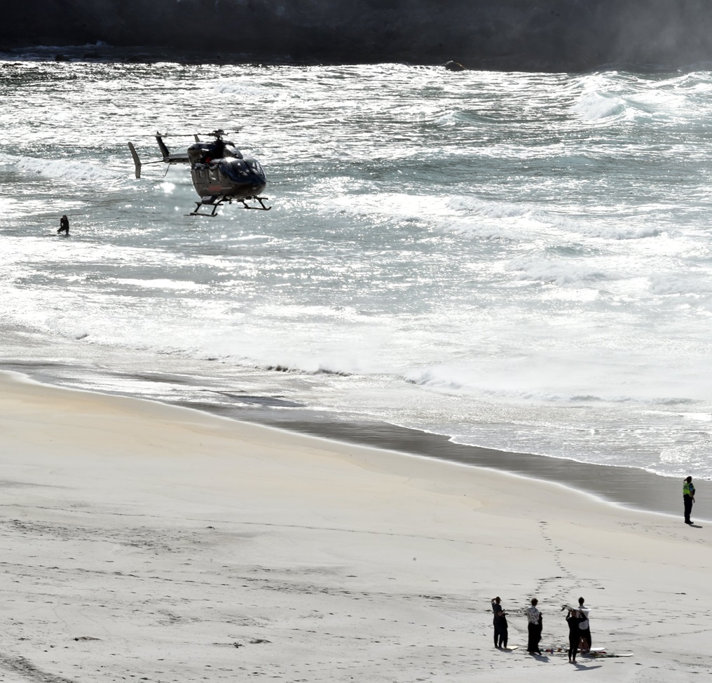A rescue helicopter was called in to assist during the incident at Smaills Beach. Photo: Gregor...