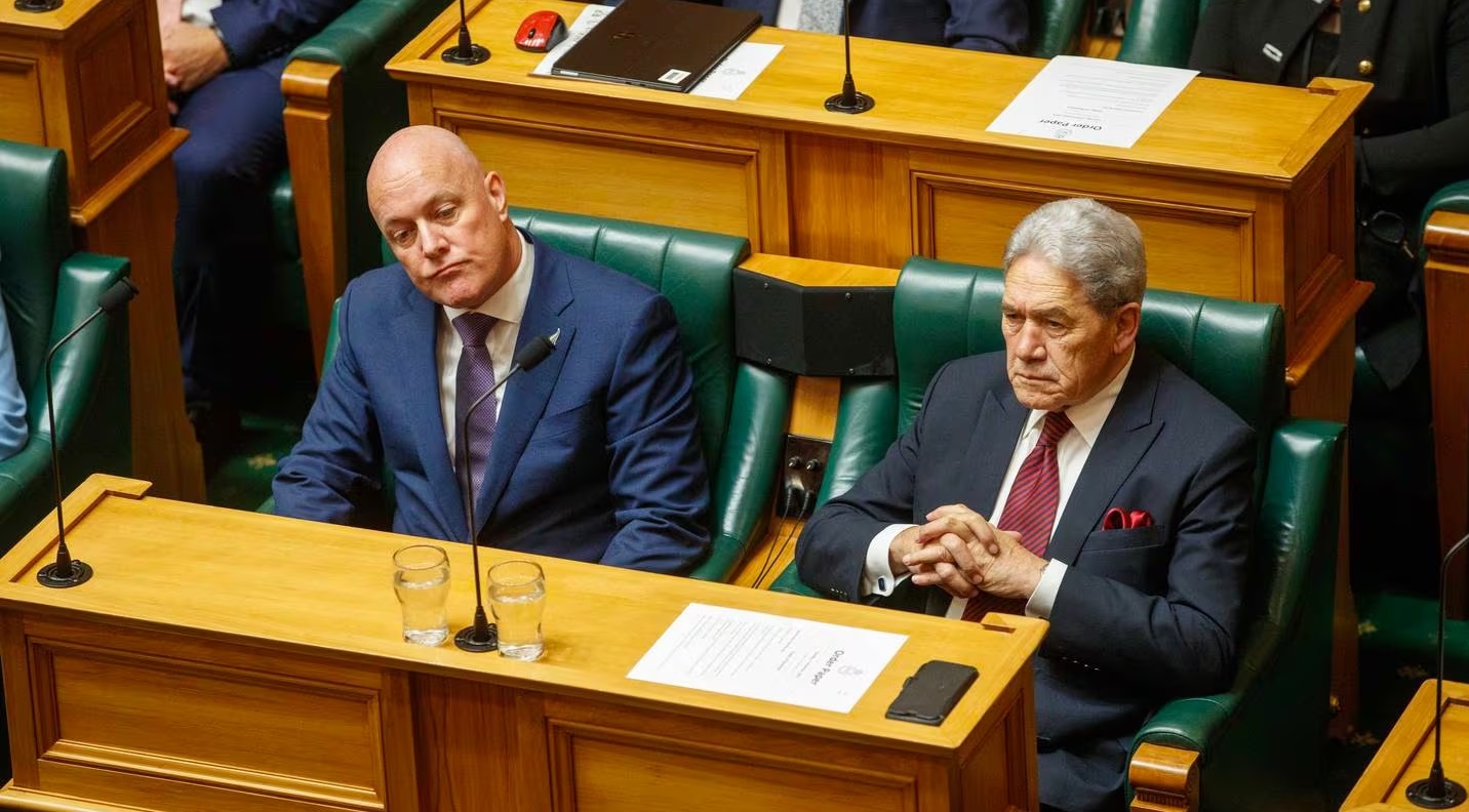 Prime Minister Christopher Luxon (L) and Deputy Prime Minister Winston Peters watch on as the...