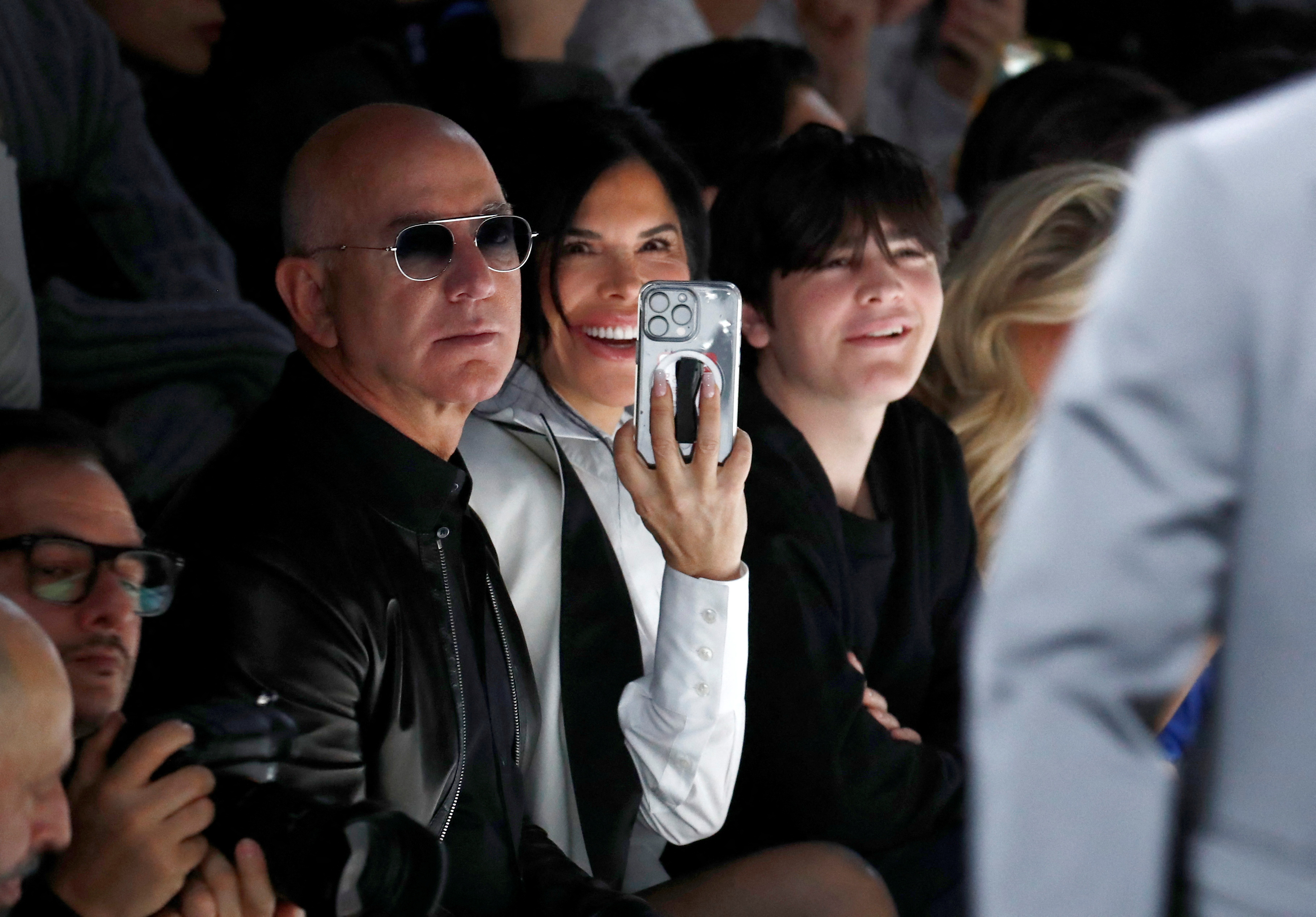 Jeff Bezos and Lauren Sanchez  at the Dolce & Gabbana autumn-winter 2024-25 men’s collection in...