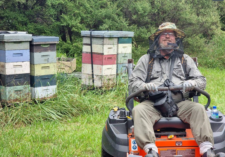 Sean Pont now covers up completely while working near bee hives. 
