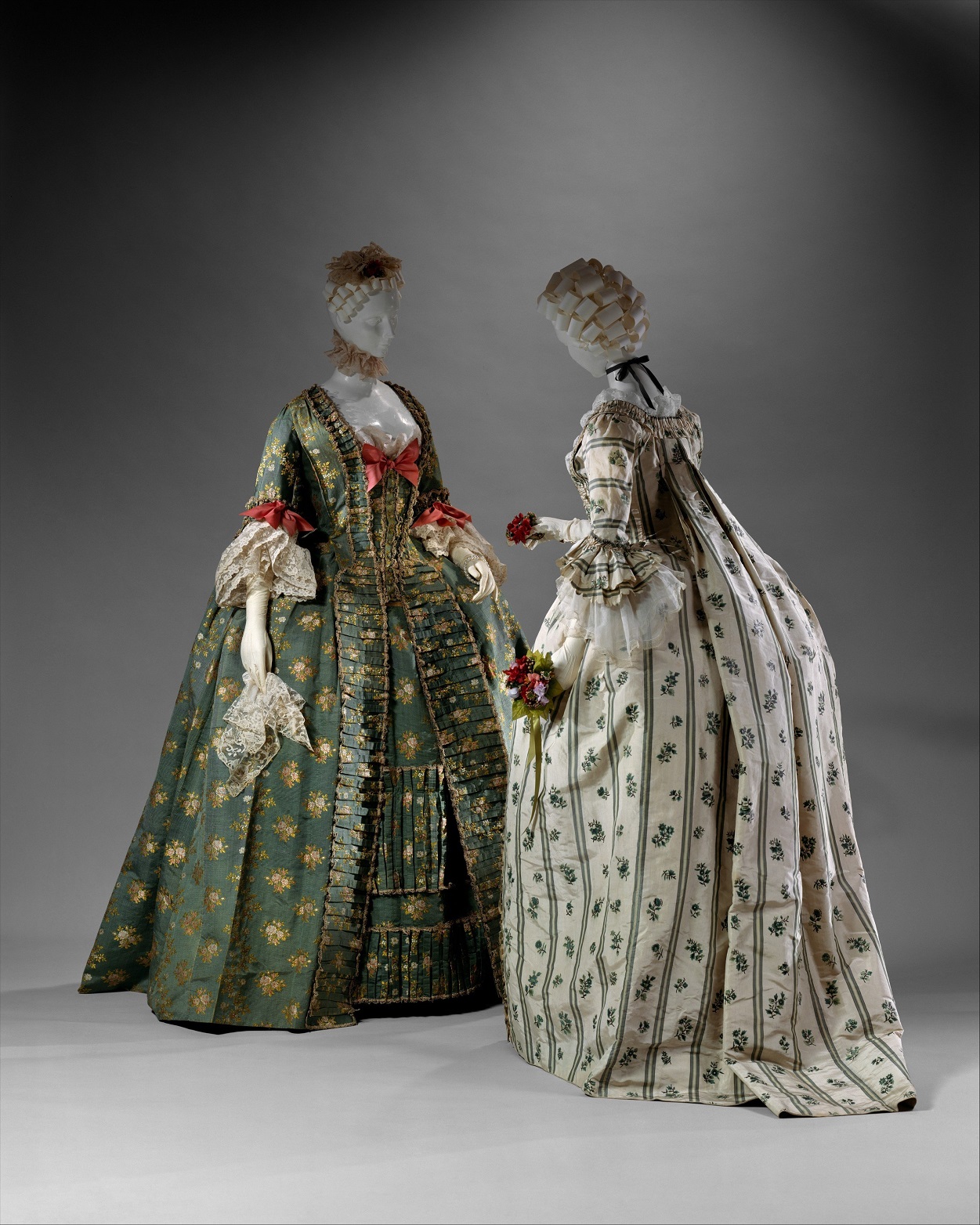 The robe a la francaise was a mantua style that featured loose back pleats that draped to the...