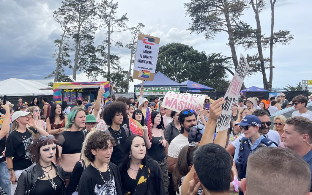 Crowds gather around Luxon at the Big Gay Out in Coyle Park. Photo: Katie Scotcher/RNZ