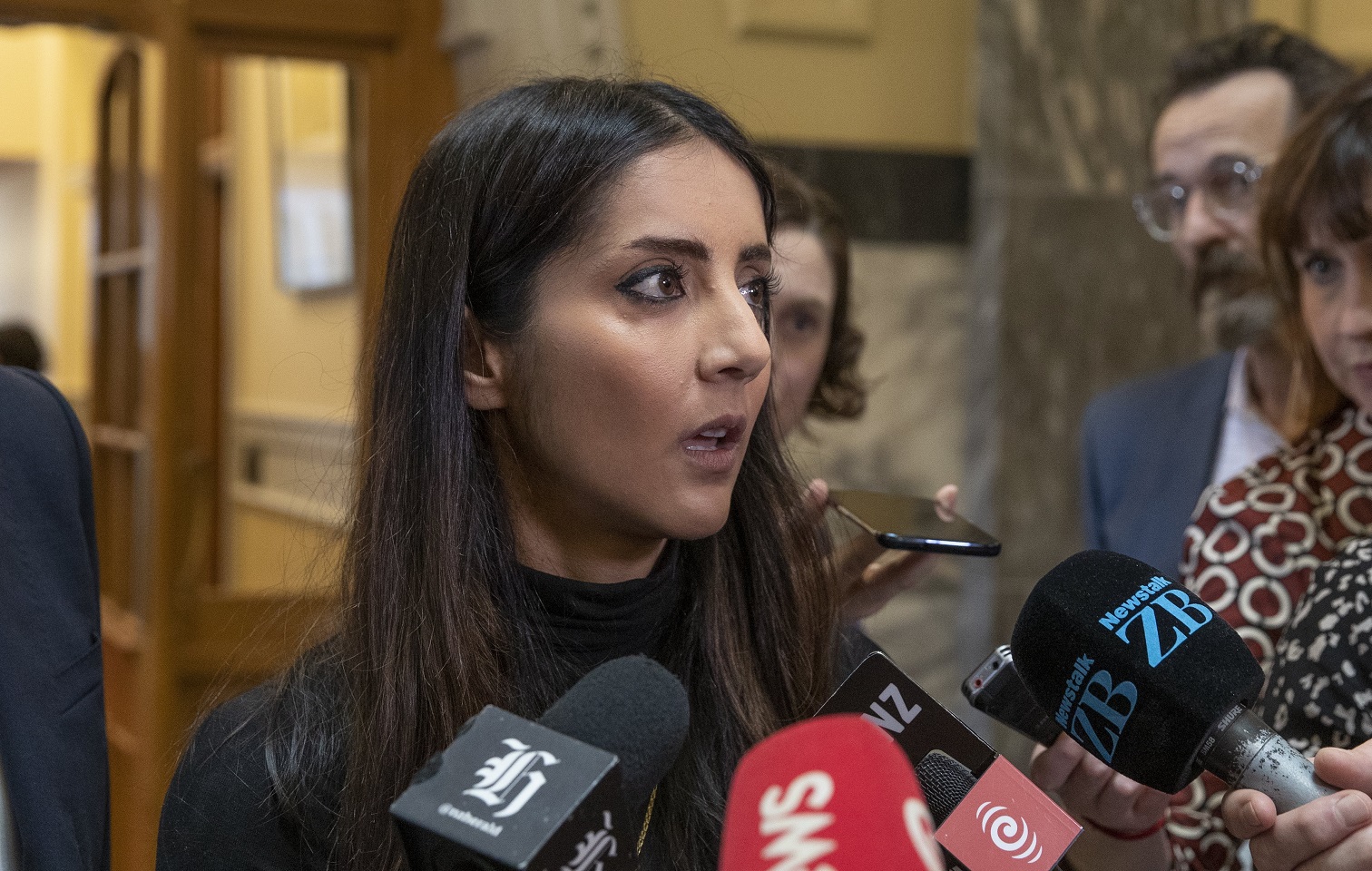 Former MP Golriz Ghahraman speaking to media after it was revealed she would be escorted by...