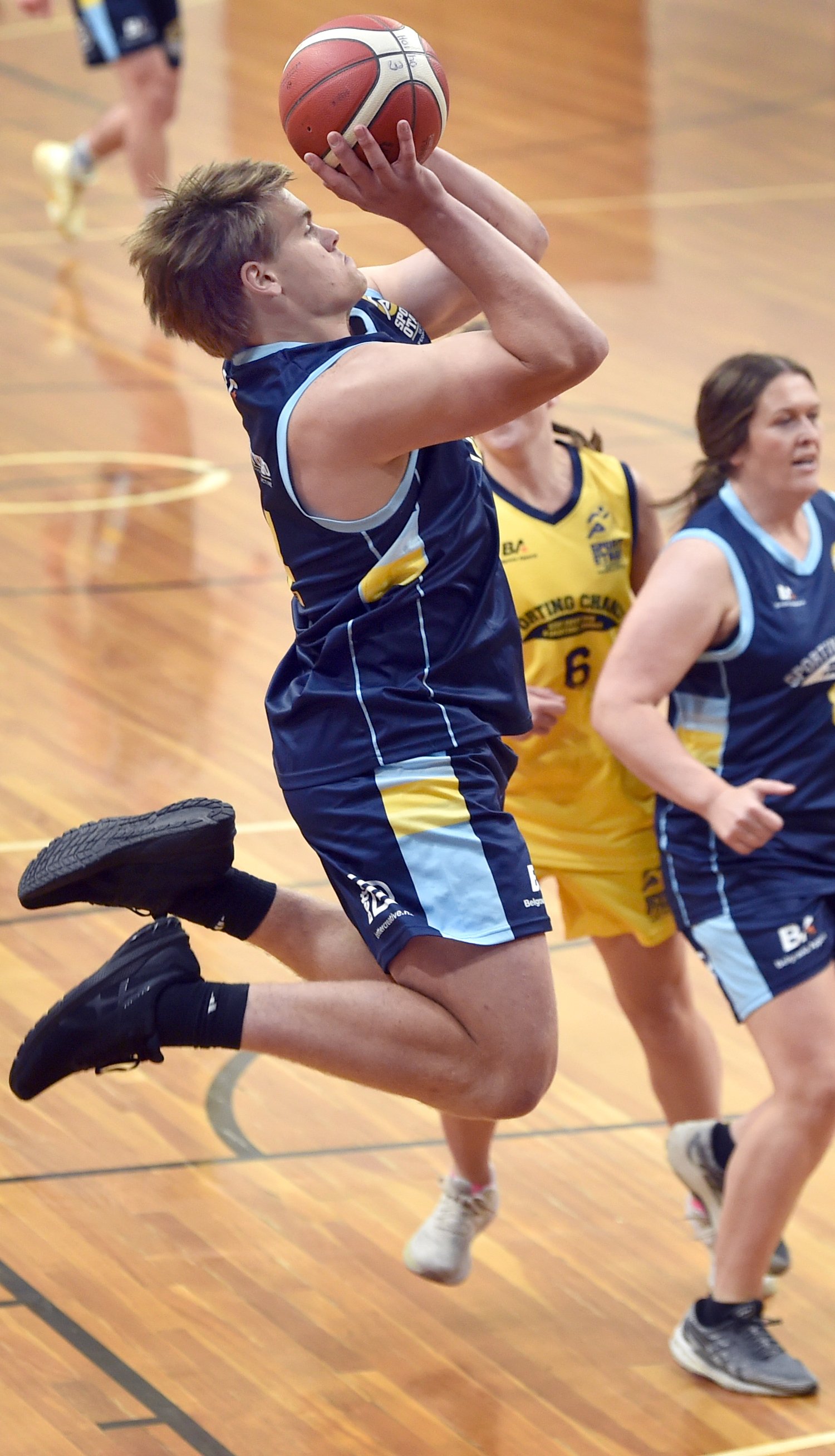 Otago rugby player Harry Taylor, representing team blue, goes for the hoop in the Sport Otago All...