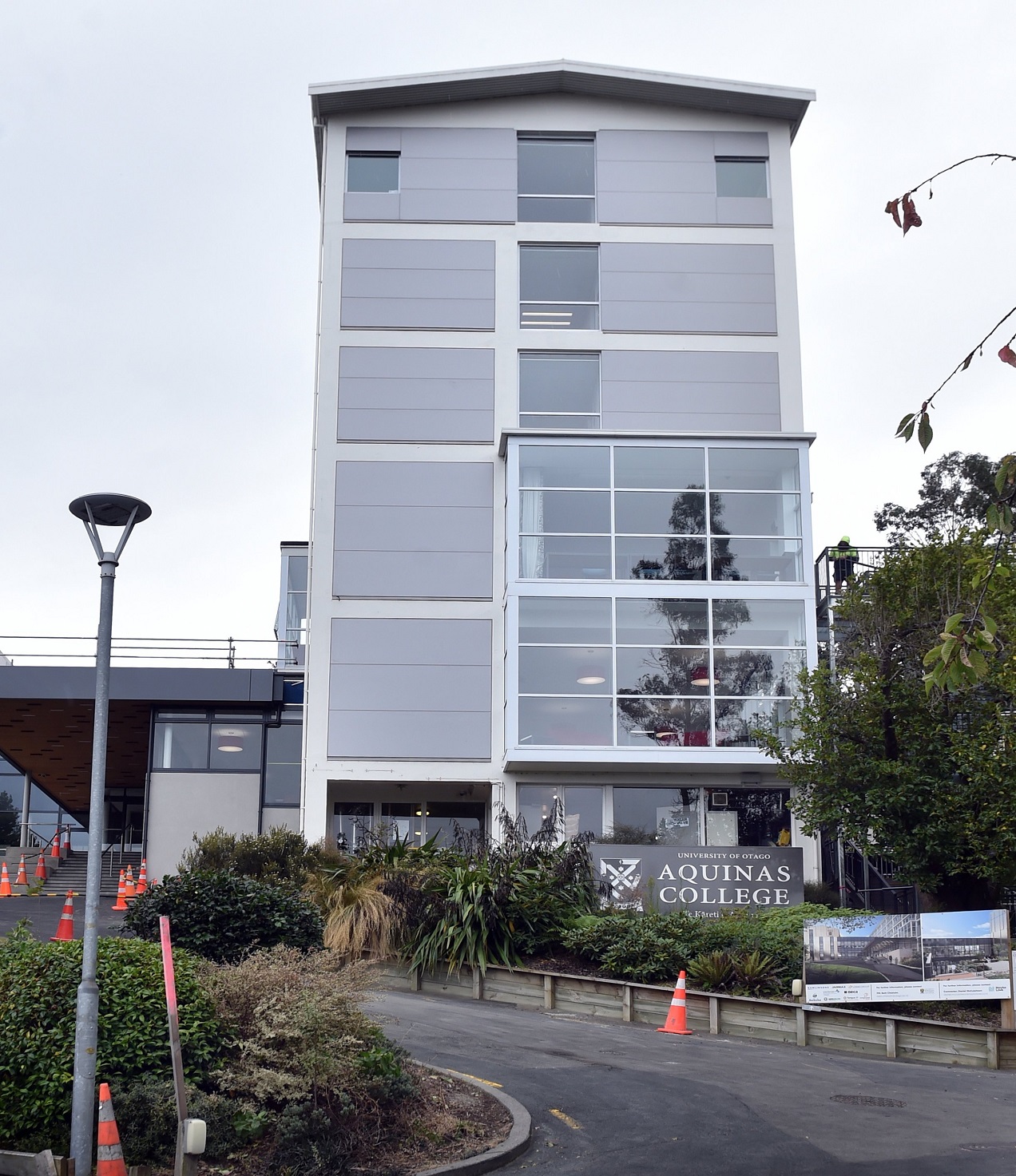 The extension of University of Otago residential hall Aquinas College has been hit by delays....