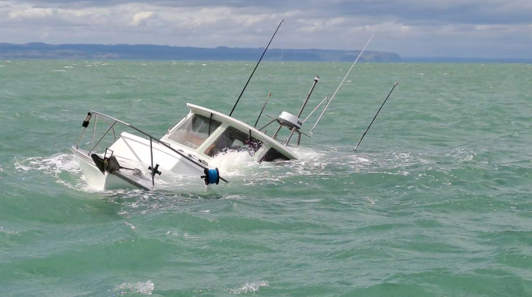 The boat hit a log and sank within a few hundred metres of the Port of Napier today. Photo:...