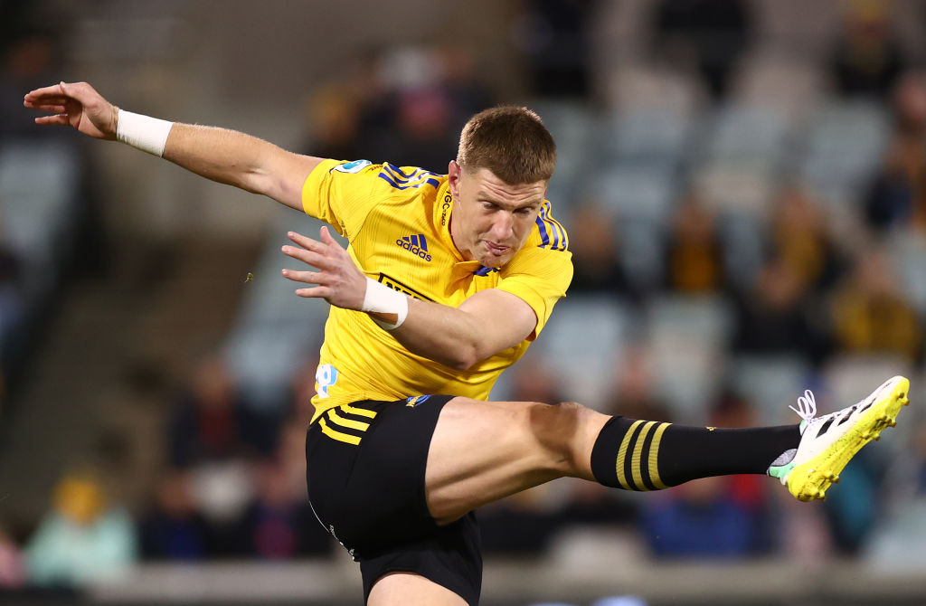 Jordie Barrett of the Hurricanes kicks ahead during a match last year. Photo: Getty Images 