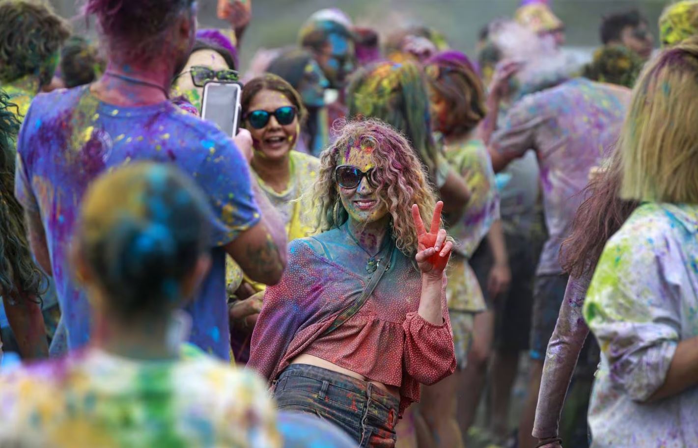 Festival goers celebrating Holi at the Hare Krishna Centre in Riverhead. Photo: NZ Herald