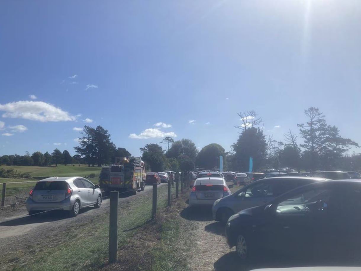 Cars waited up to three hours to leave the Krishna Holi festival in Kumeū. Photo: NZ Herald