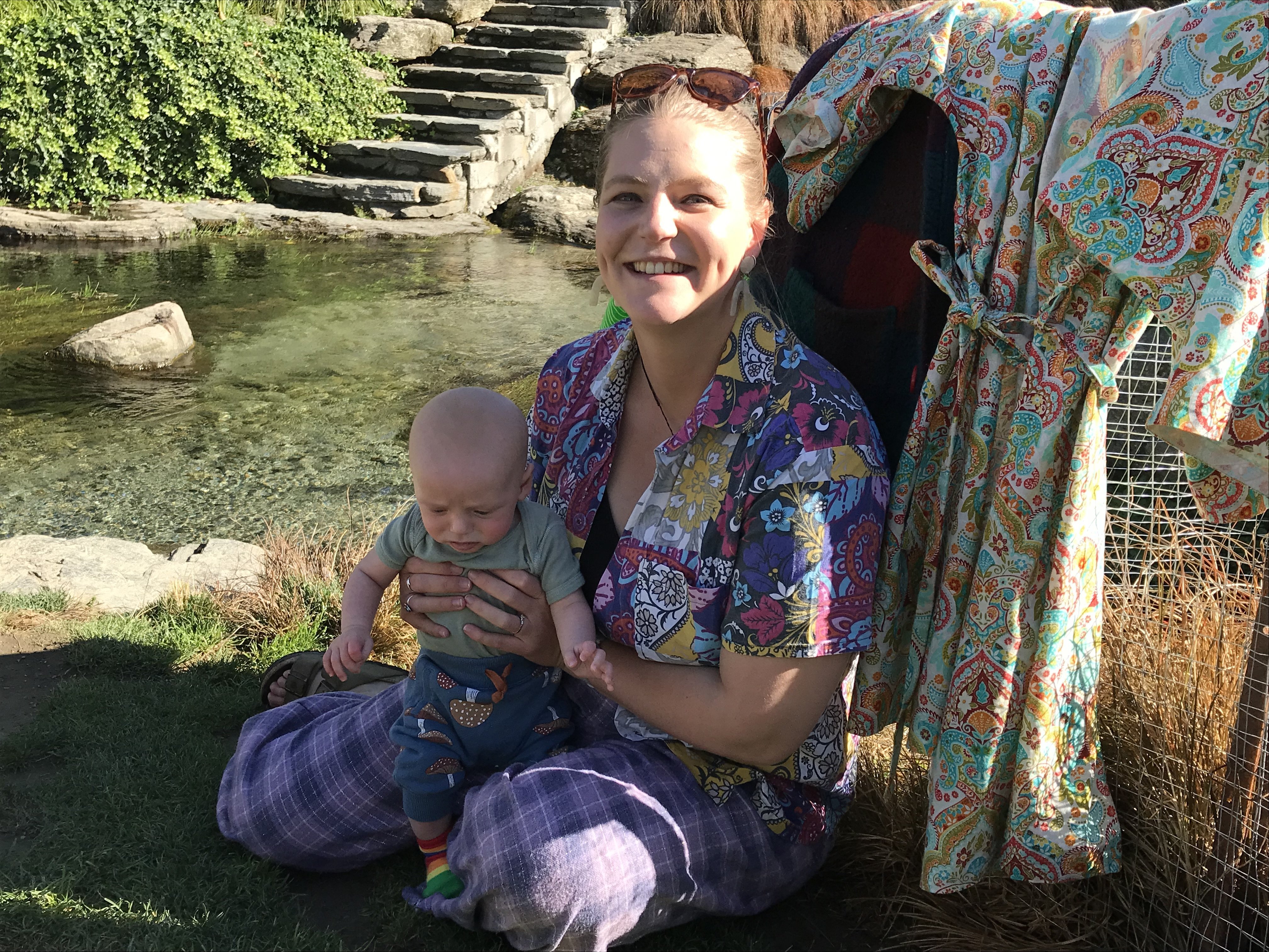 Wānaka fashion creative Jess Rasmussen, 34, holds her son Finn. She is wearing her own...