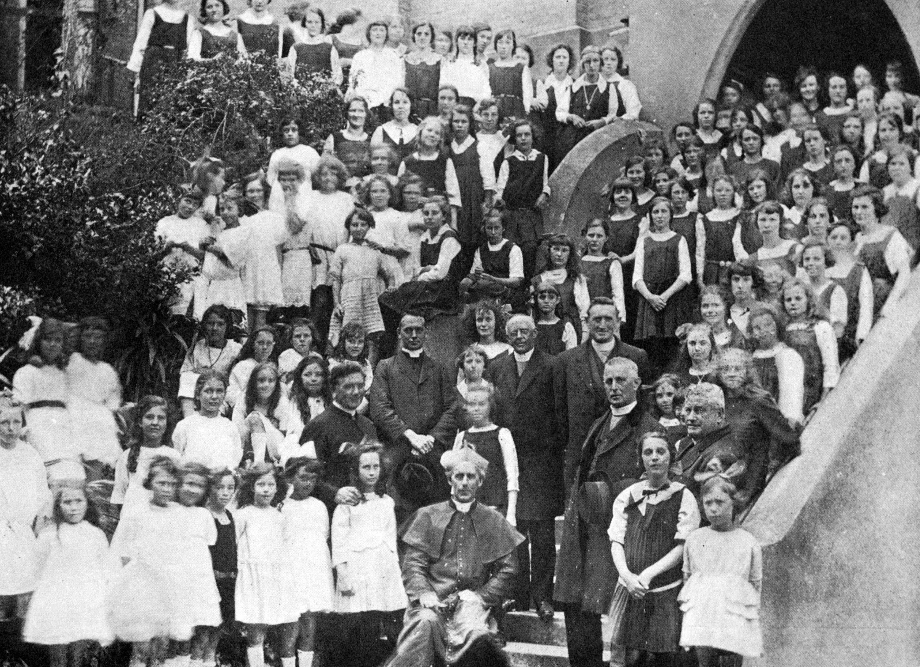 Catholic archbishop the Right Rev Dr Mannix (seated) at St Dominic’s College, Dunedin with pupils...