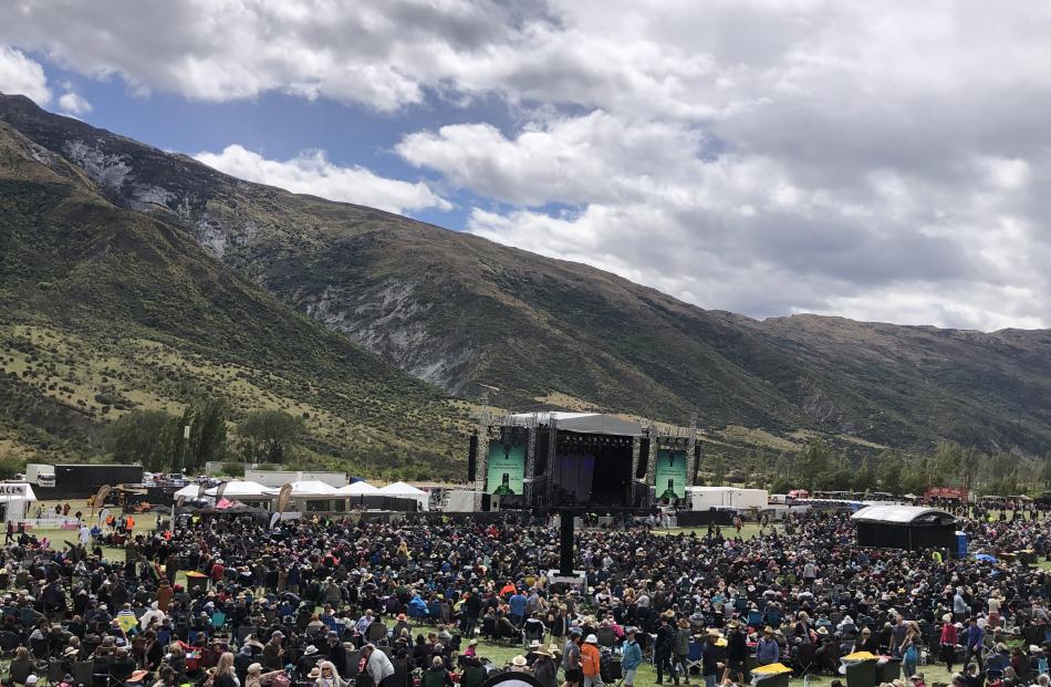 About 13,500 people braved a brutal southerly, which persisted for most of this year’s concert....