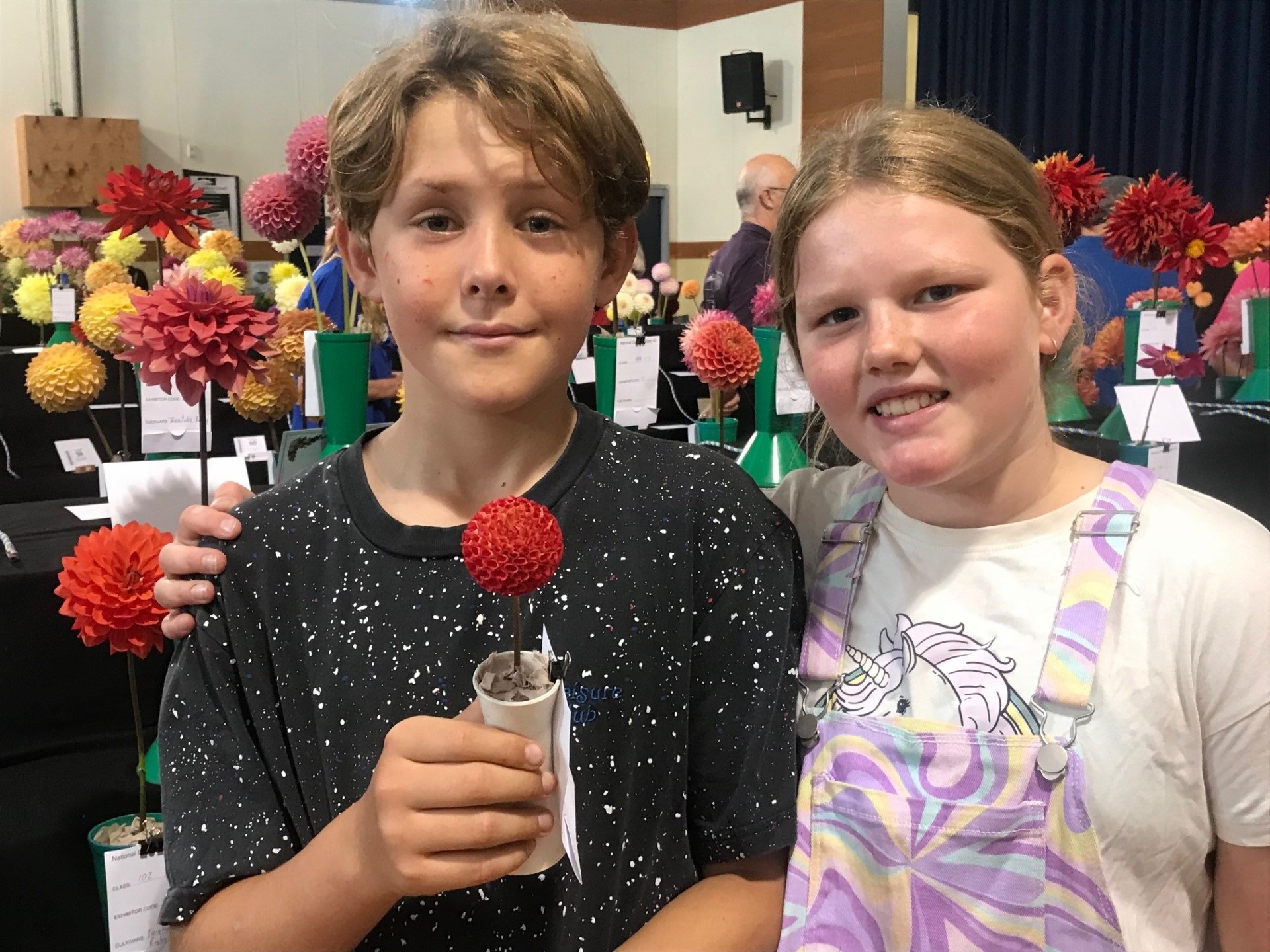 Waiting on results Waikouaiti siblings Walker Hart, 11, and Emily Hart-Walton, 10, were all smiles.