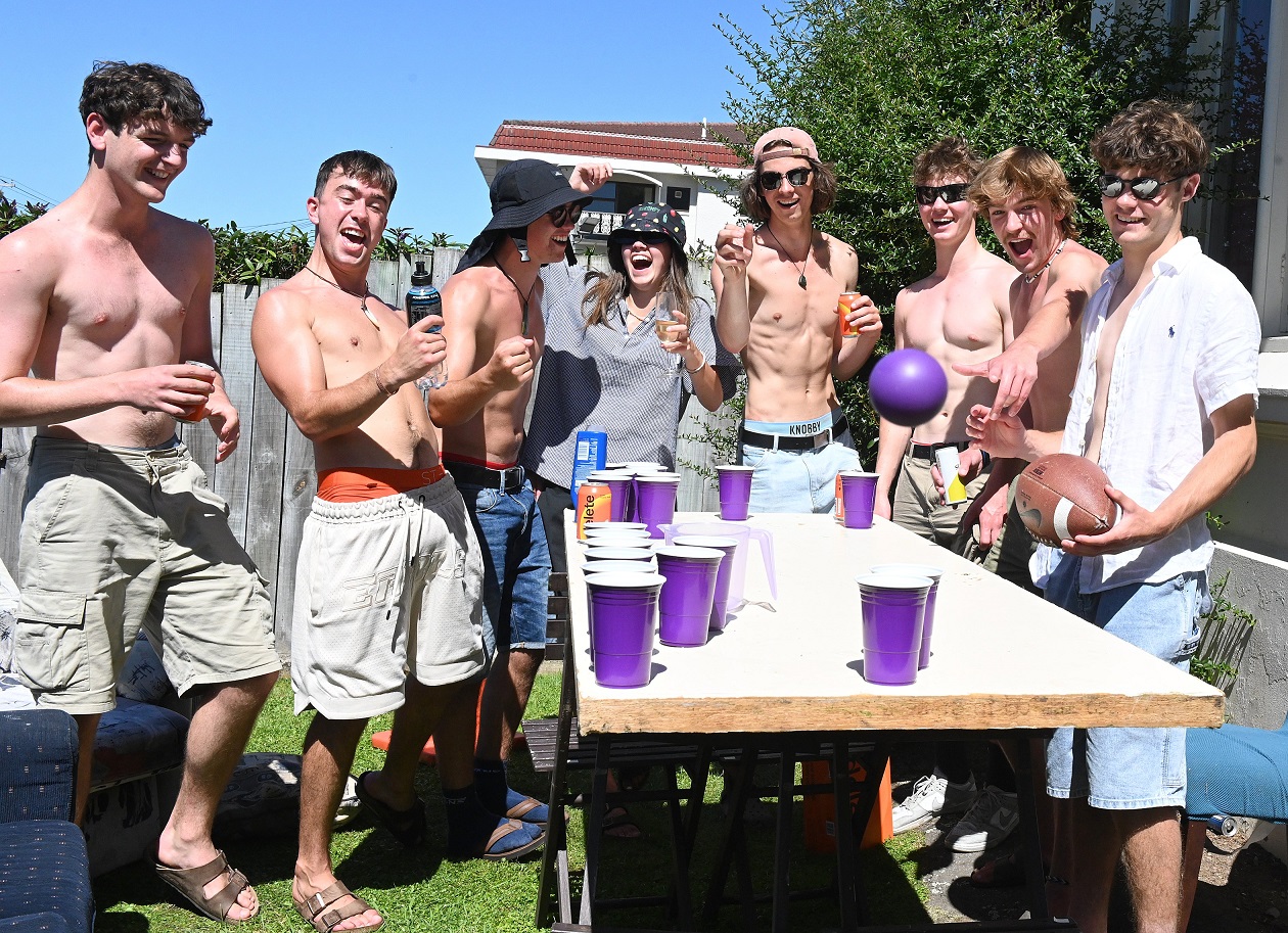 Getting in an afternoon round of beer pong outside a flat in Castle St North yesterday were...