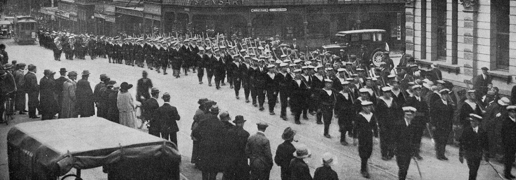 The crew of HMS Chatham march up Princes St, Dunedin. — Otago Witness, 25.3.1924