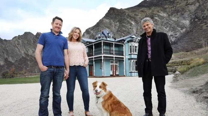 Previous owners Jamie and Melissa McMurtrie with Grand Designs host Chris Moller in front of the...