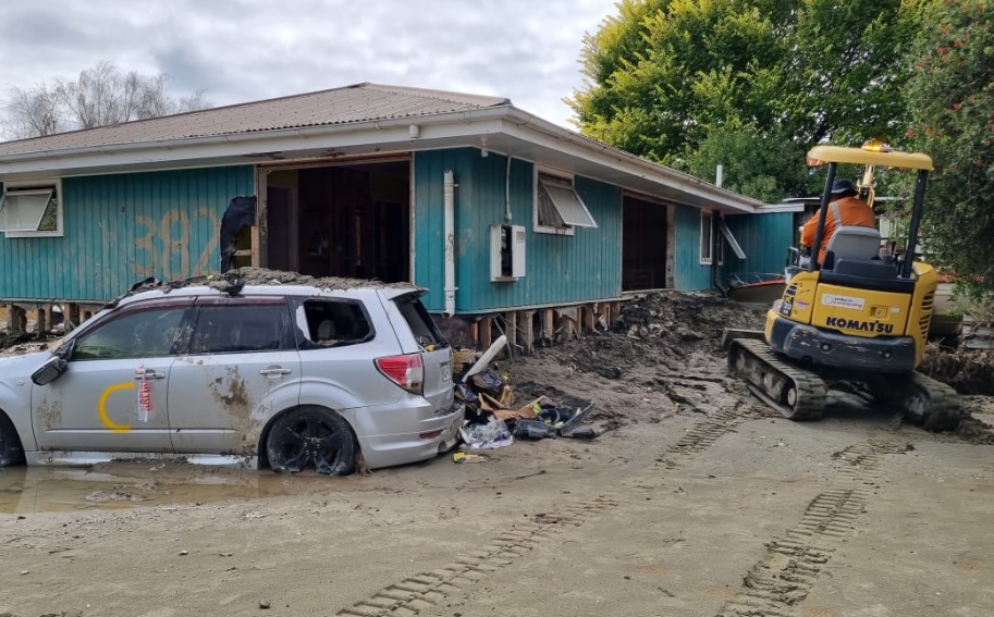 A yellow-stickered home in Esk Valley after Cyclone Gabrielle. Photo: RNZ