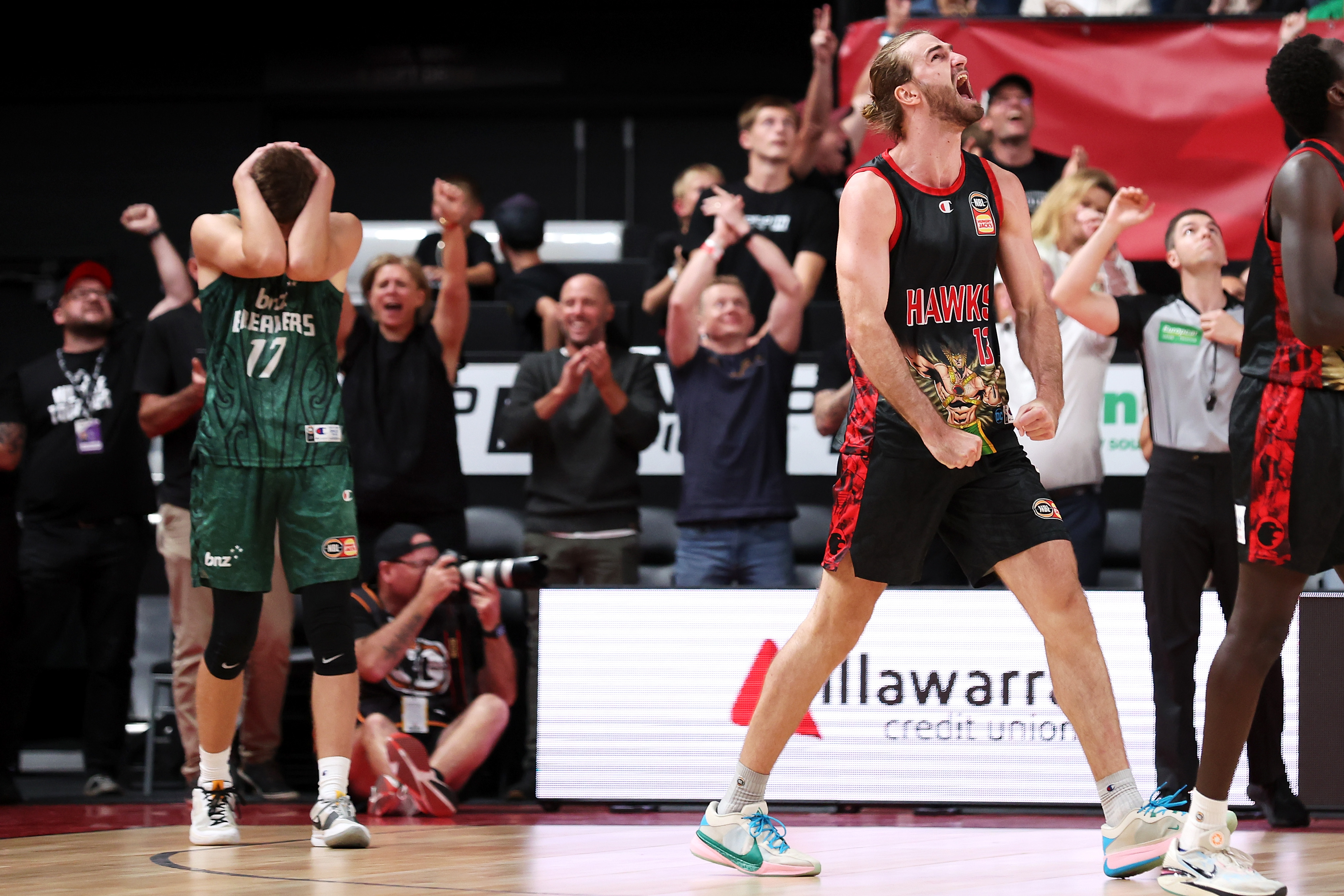 Samson Froling of the Hawks celebrates victory over the Breakers last night. Photo: Getty Images 