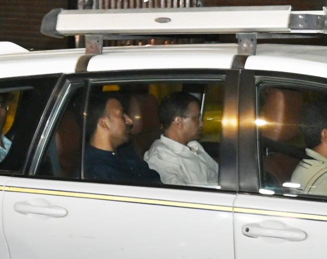 Delhi Chief Minister and Aam Aadmi Party chief Arvind Kejriwal being driven away by police. Photo...