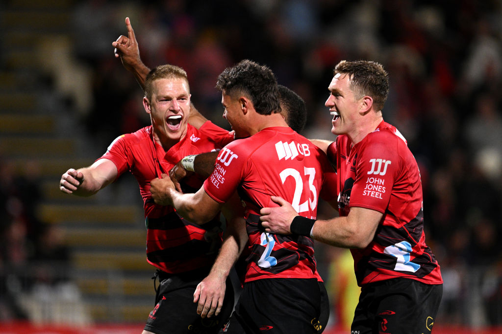 The Crusaders' Johnny McNicholl celebrates scoring a try against the Chiefs. Photo: Getty