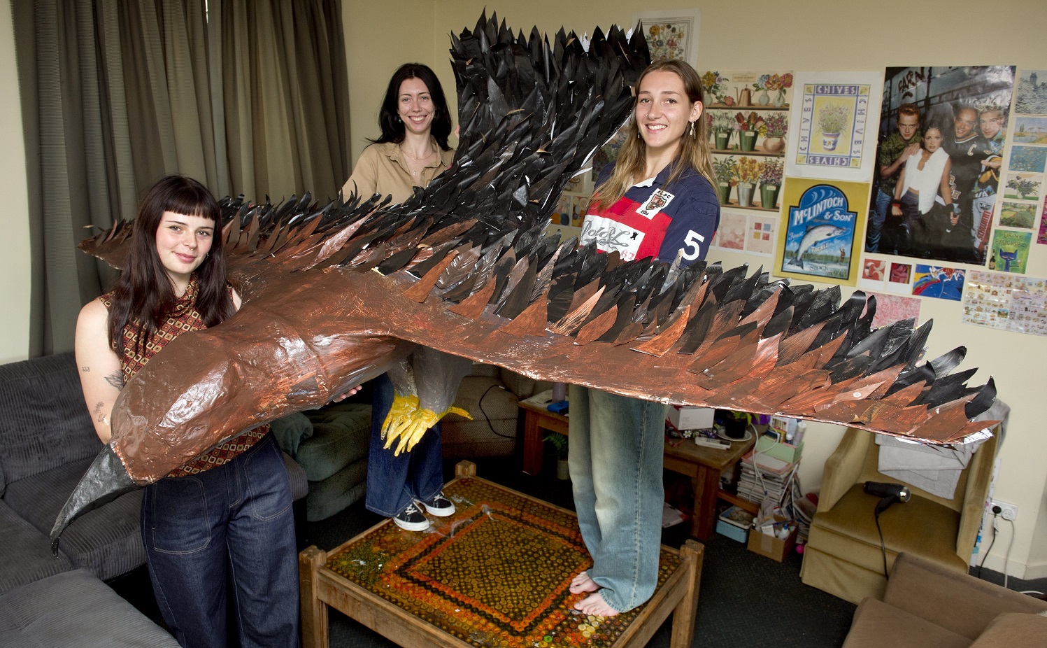 Dunedin sculptor Maleah Abbott-Newland (left) has created a life-size Haast eagle in her flat,...