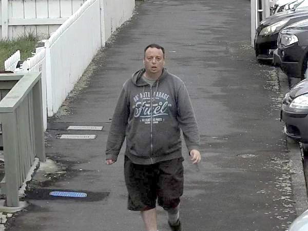 A CCTV image released by police yesterday shows missing man Jon, 44, walking in Castle St the day...