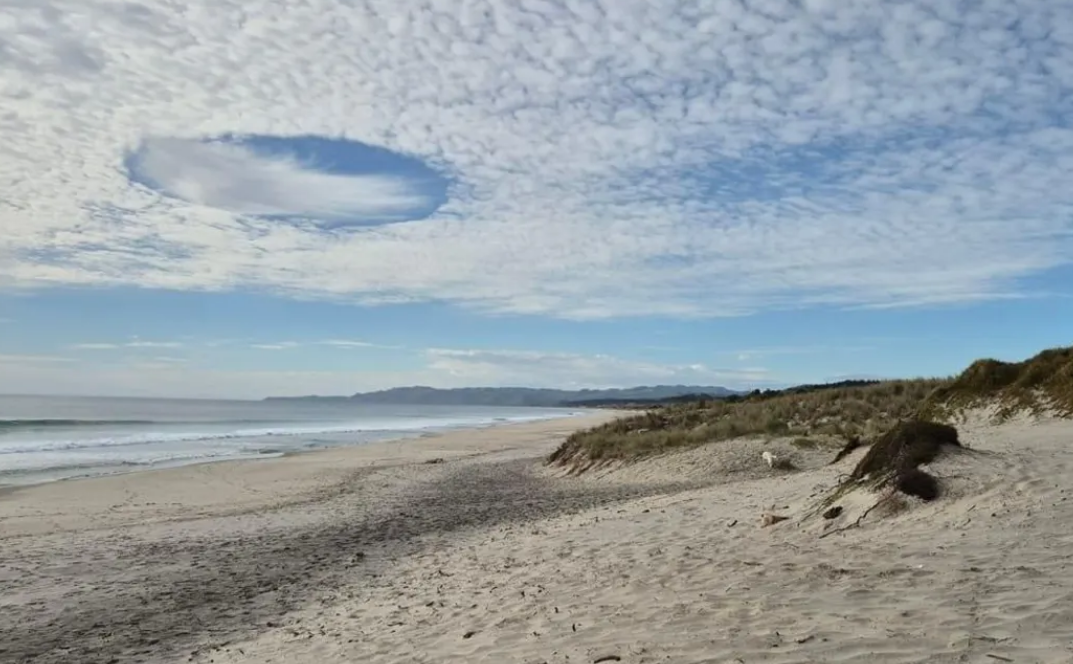The unusual cloud formation seen from Forestry Beach, Te Arai, today. Photo: Supplied/Sheila Russell
