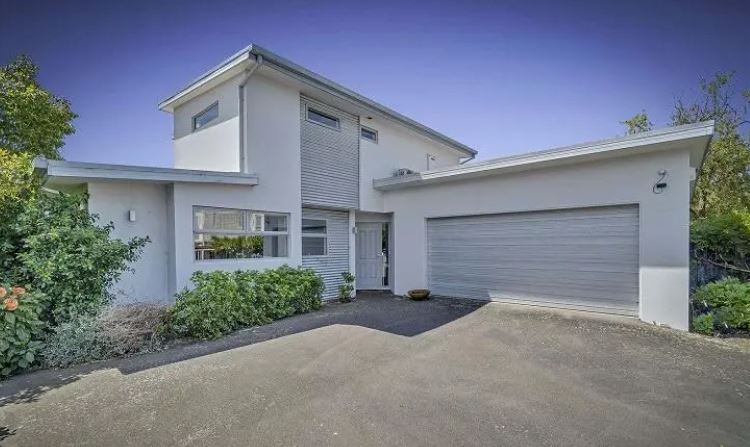 The tired townhouse on Clare Rd, Merivale, sold at a competitive auction for $1.475m. Photo:...