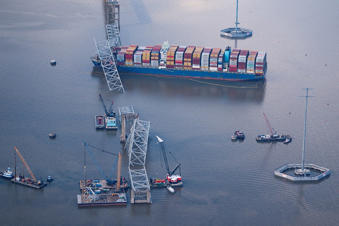 The cargo vessel Dali sits amid wreckage of the Francis Scott Key Bridge in Baltimore Harbor...