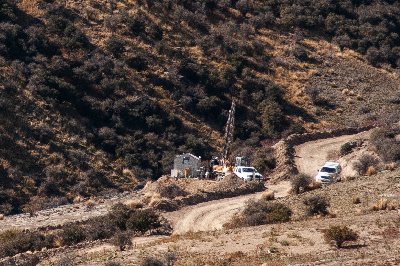 Santana Minerals contractors drilling near the historic "Come in Time'' battery site in 2022,...