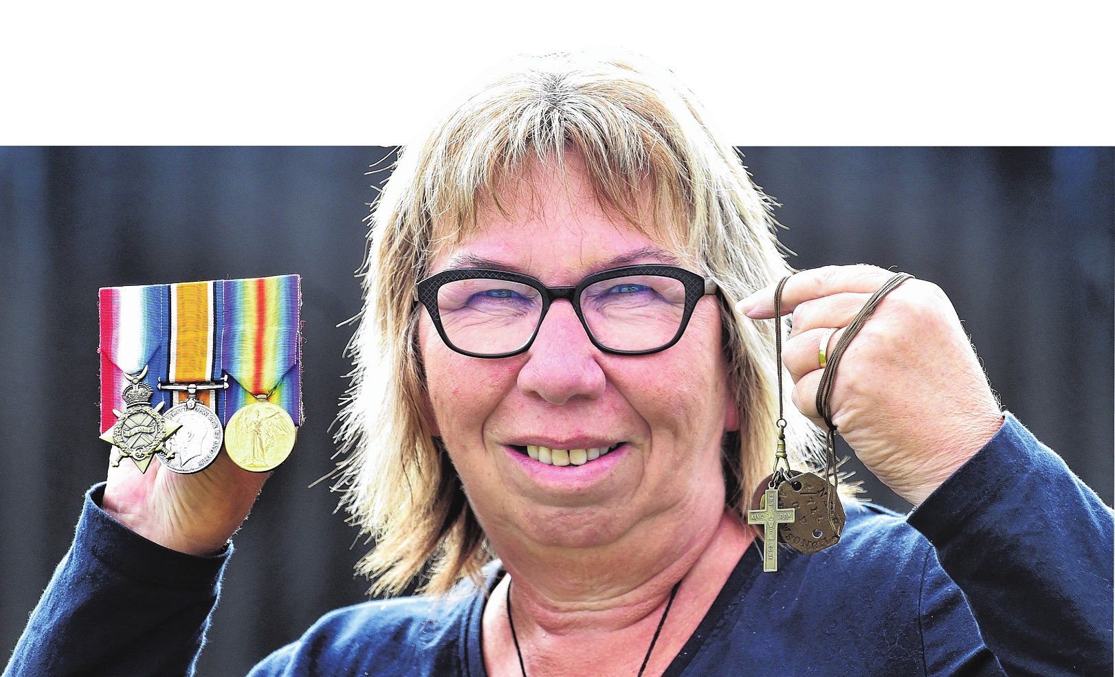 Cindy Kennedy with the medals awarded to her great-uncle. Photo: Peter McIntosh