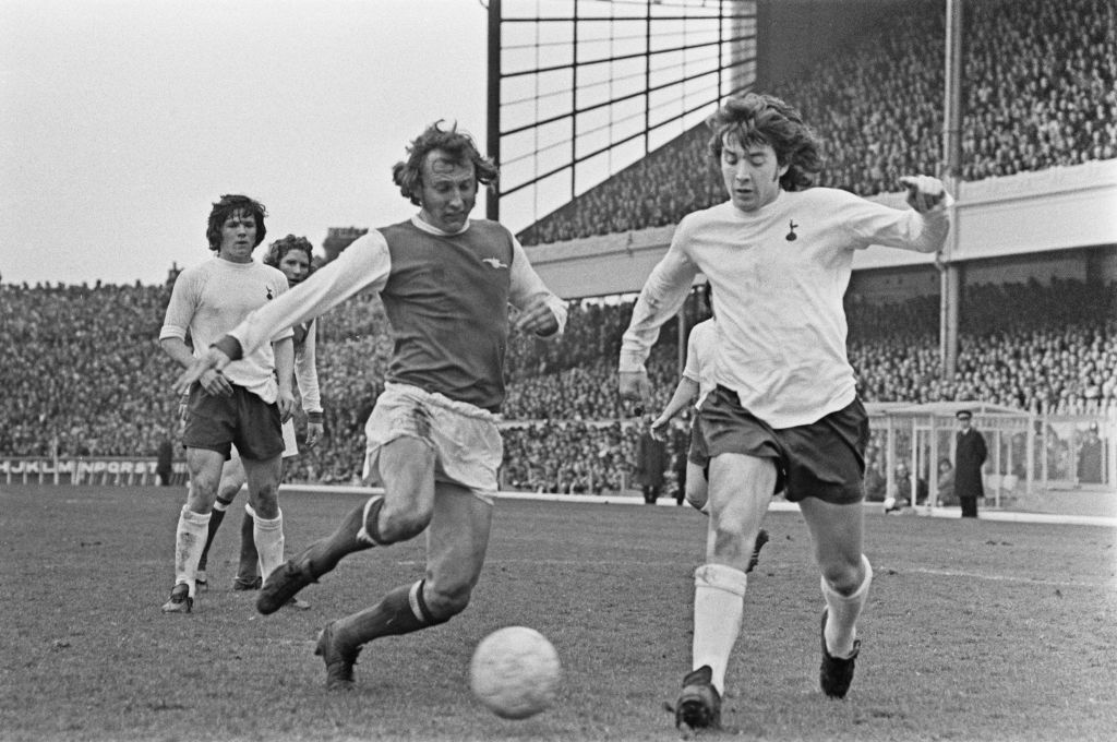 Arsenal's Bob McNab (left) and Joe Kinnear of Tottenham Hotspur compete for the ball during a...
