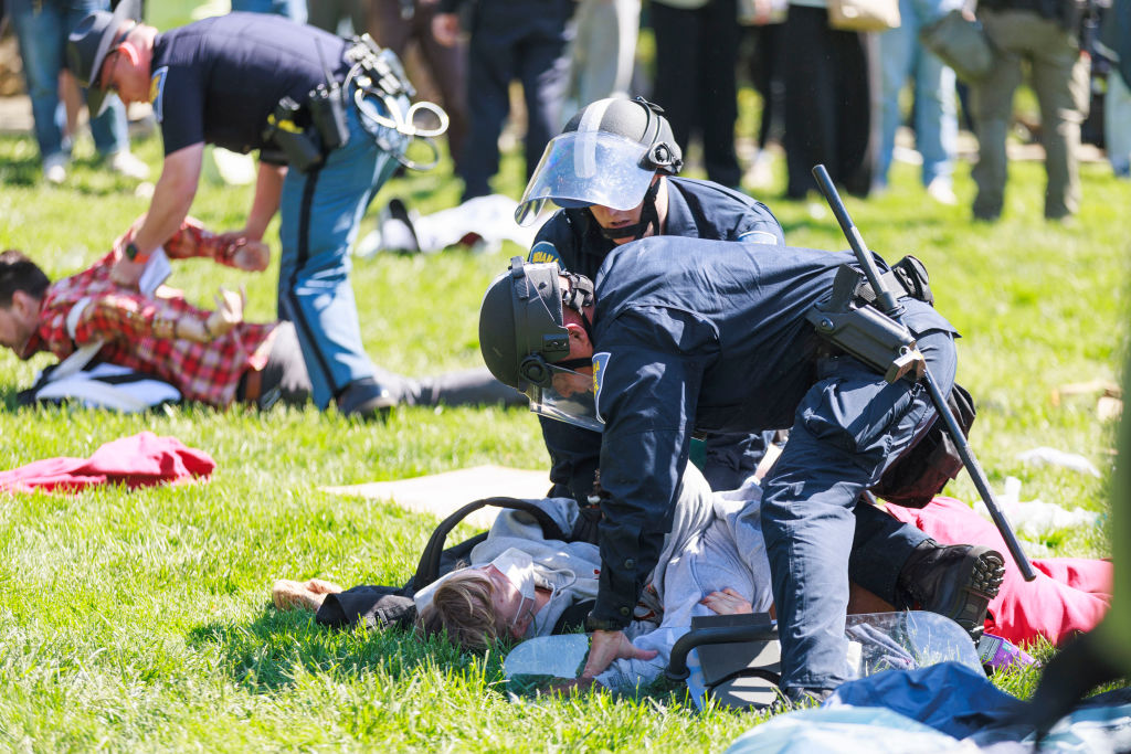 Police make arrests during a protest at Indiana University. Photo: Getty