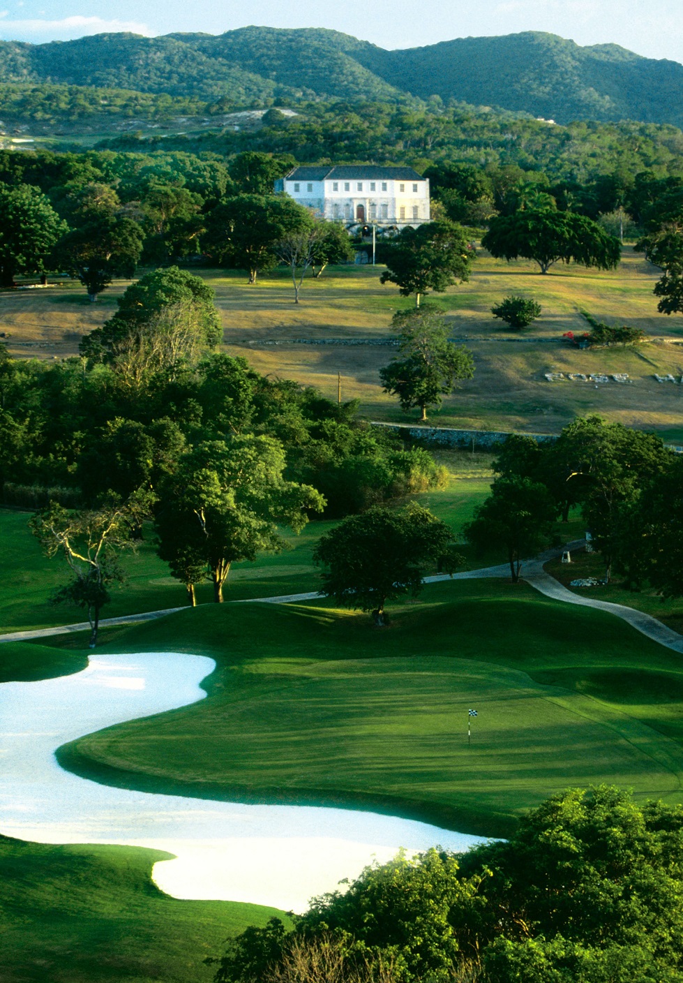 A view of Cinnamon Hill golf course shows the magnificently restored 1760 plantation house Rose...