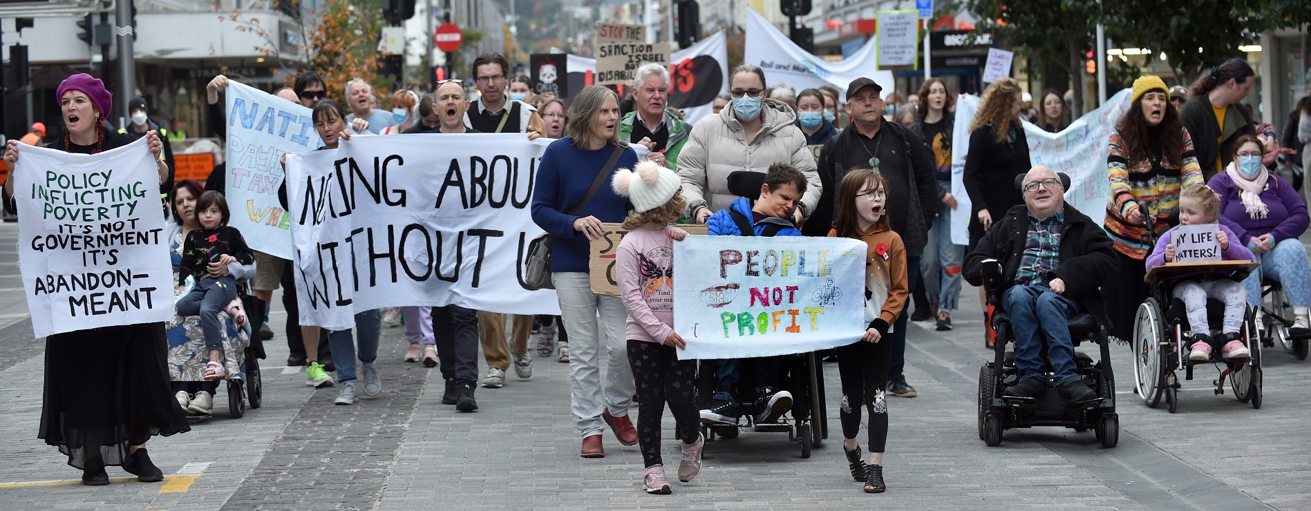 A protest group advocating for the disabled community marched to the Octagon yesterday. Photo:...