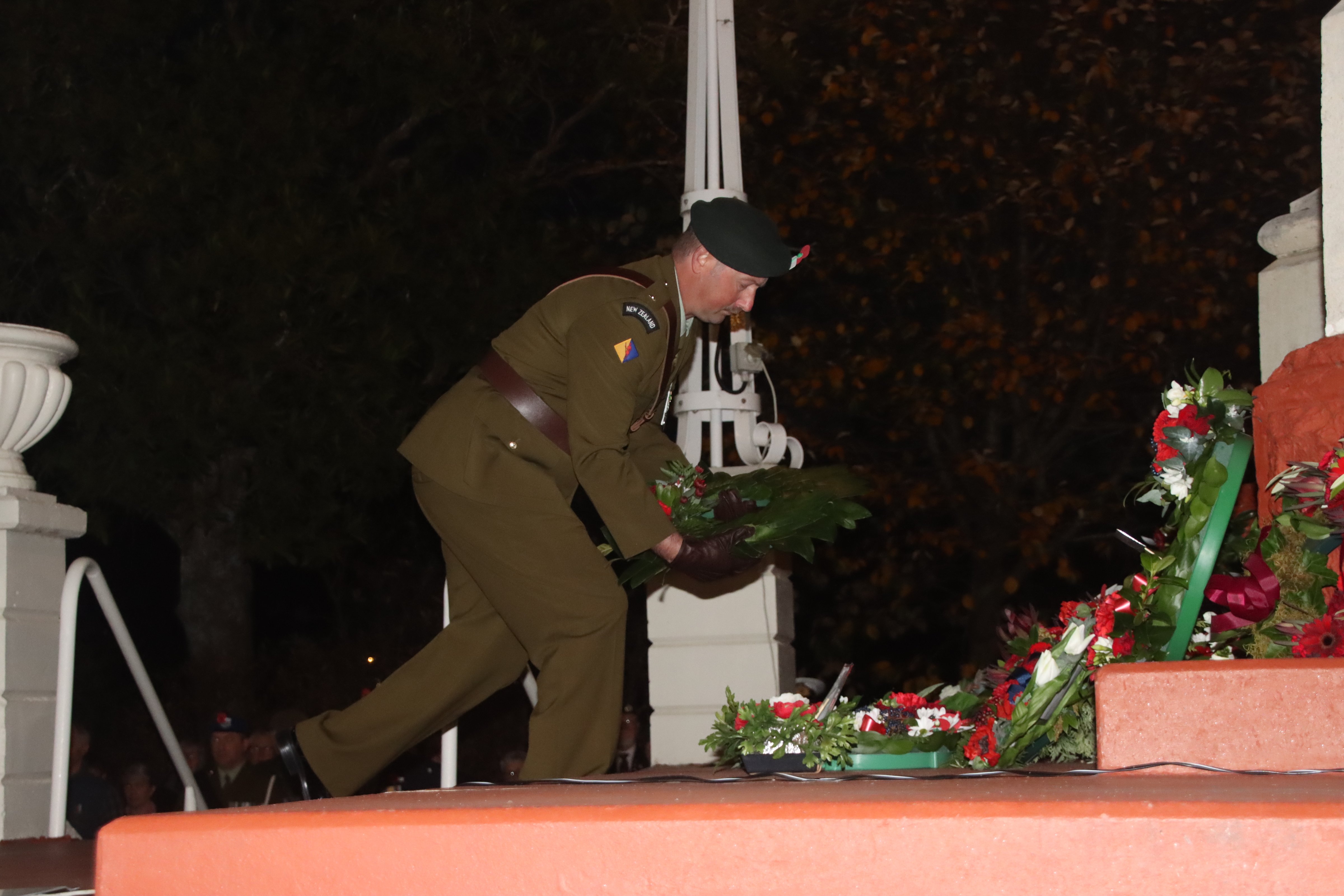 Royal New Zealand Infrantry Regiment 2nd lieutenant Paul McCullough lays a wreath at the Gore...