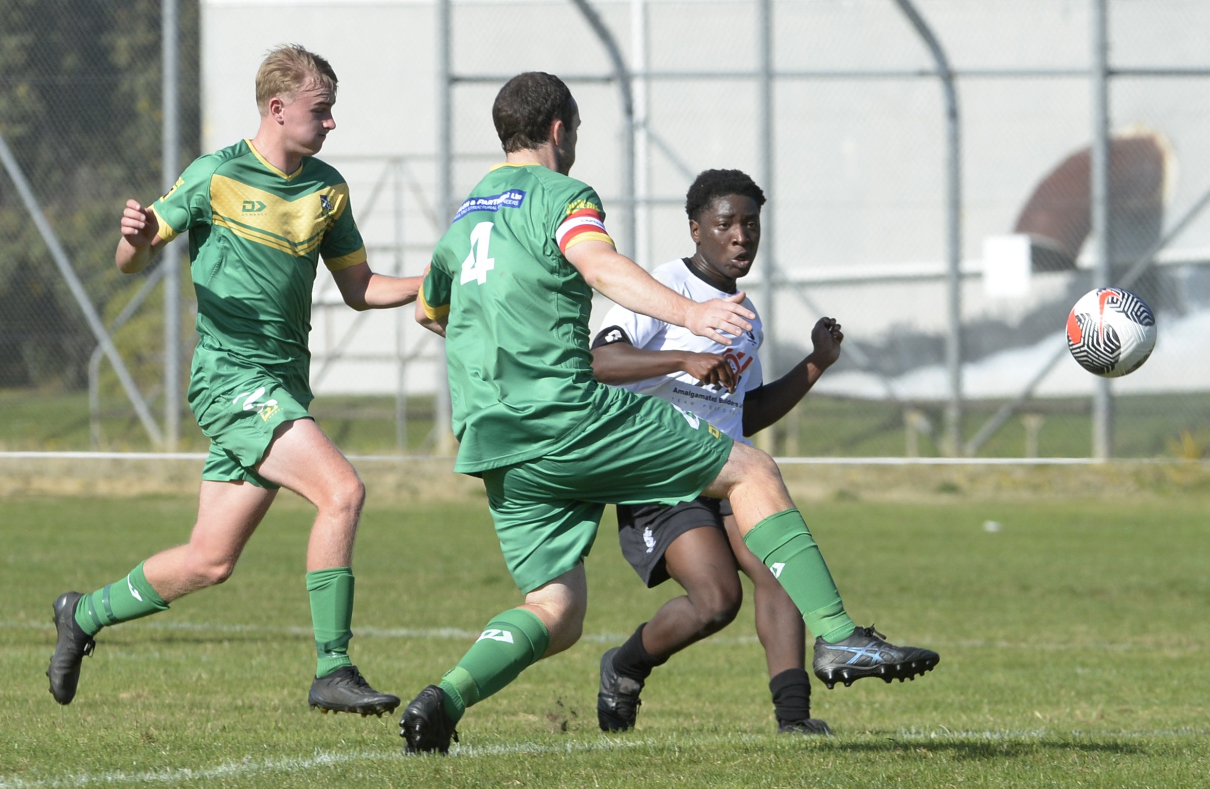 Roslyn-Wakari attacker Simba Muwunganirwa sends a cross in that was met by captain Nick Treadwell...