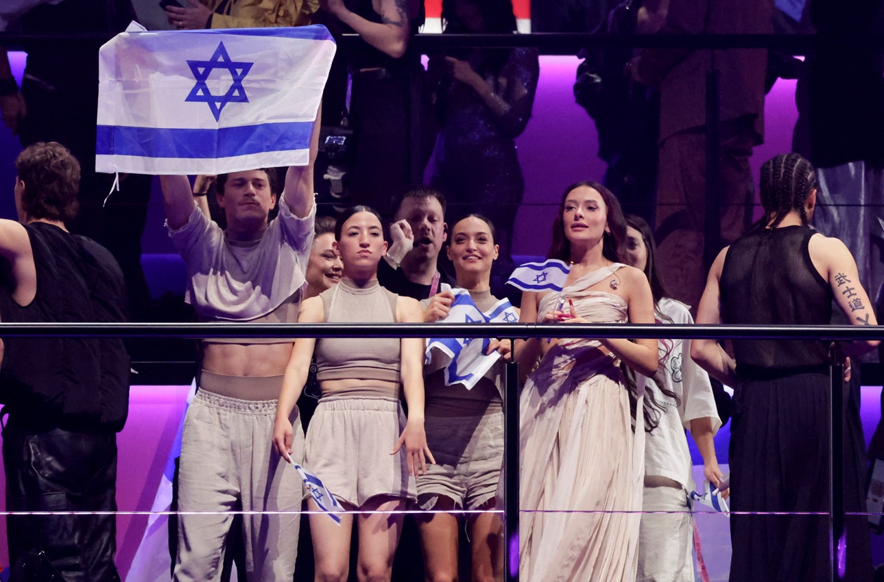 An Israeli delegation reacts to artist Eden Golan's success in the second semi-final of the 2024...