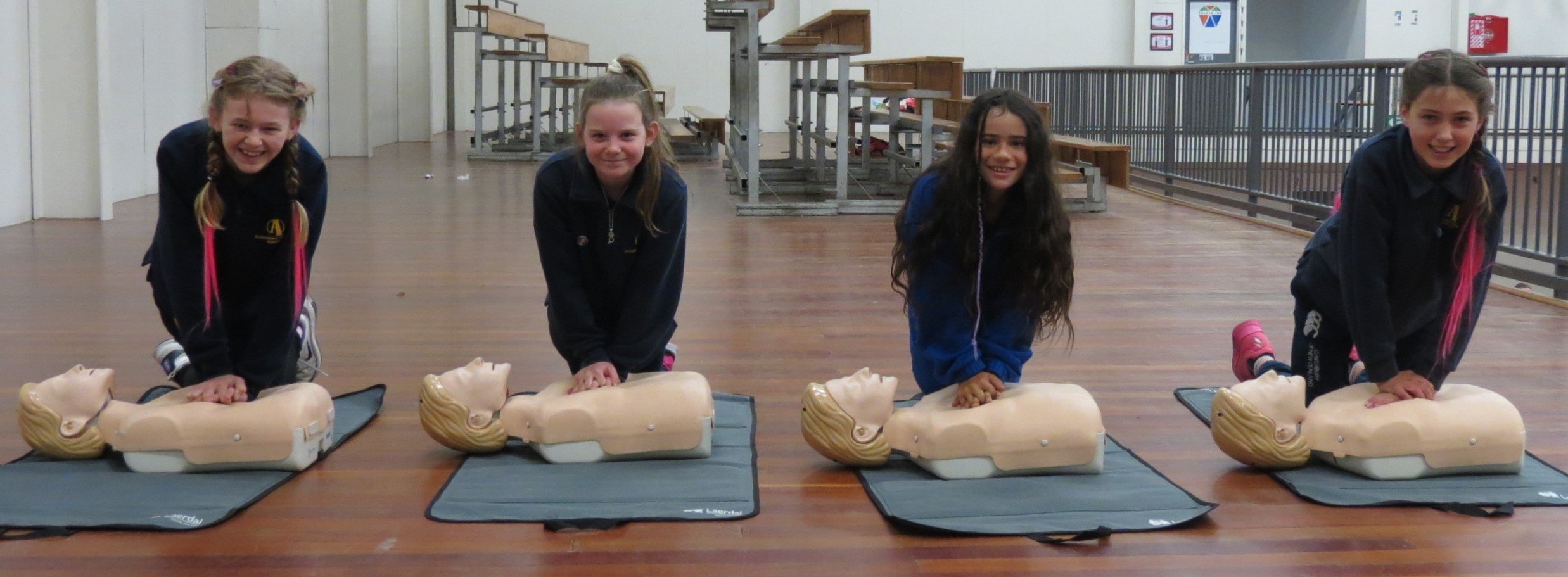 Practising their CPR skills on St John manikins are Alexandra Primary School pupils (from left)...