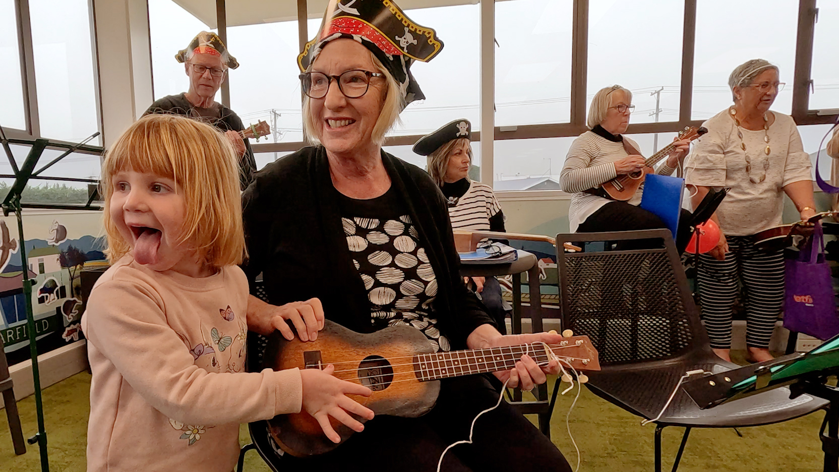 Inspiring the next generation of 'ukulelists'. Photo: Geoff Sloan