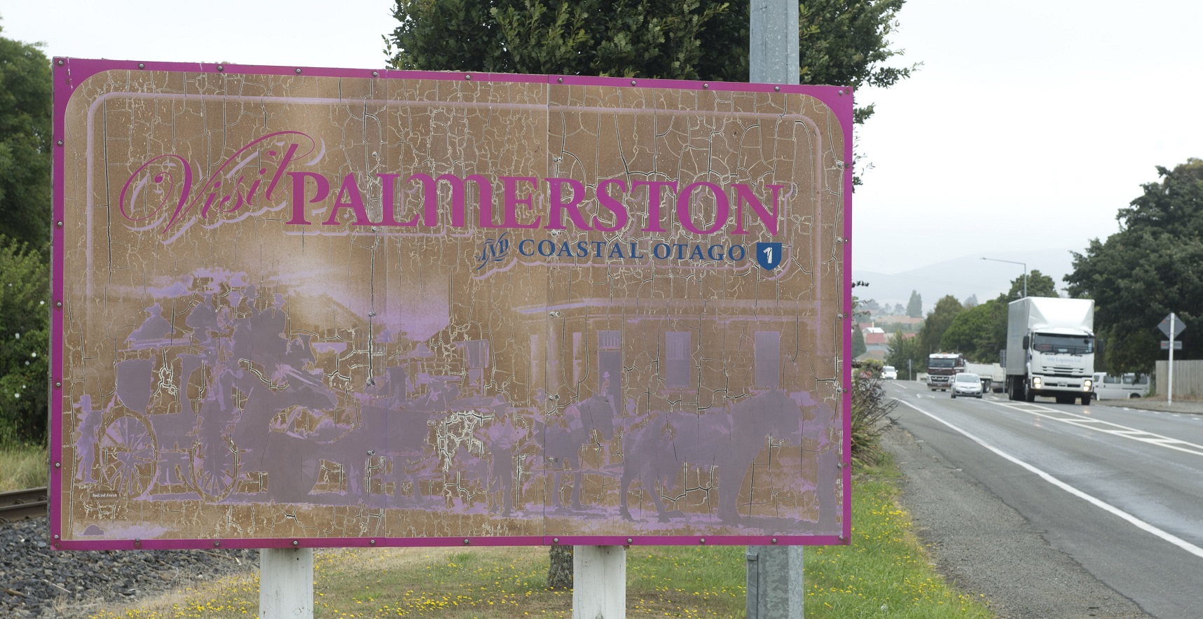 Entrance signs for Palmerston and Hampden (below) have been criticised for their shoddy...