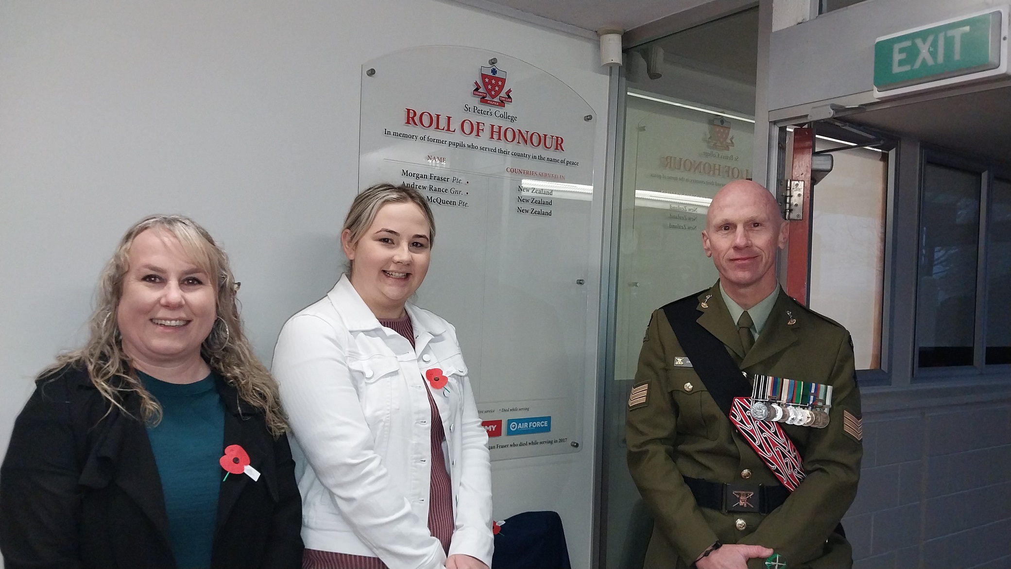 Unveiling the honours board at the school during a dawn Anzac service are (from left) St Peter’s...