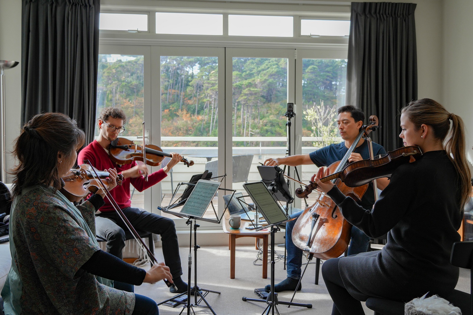 Jessica Oddie rehearses with colleagues from the NZSO ahead of the Reflections concert. From left...
