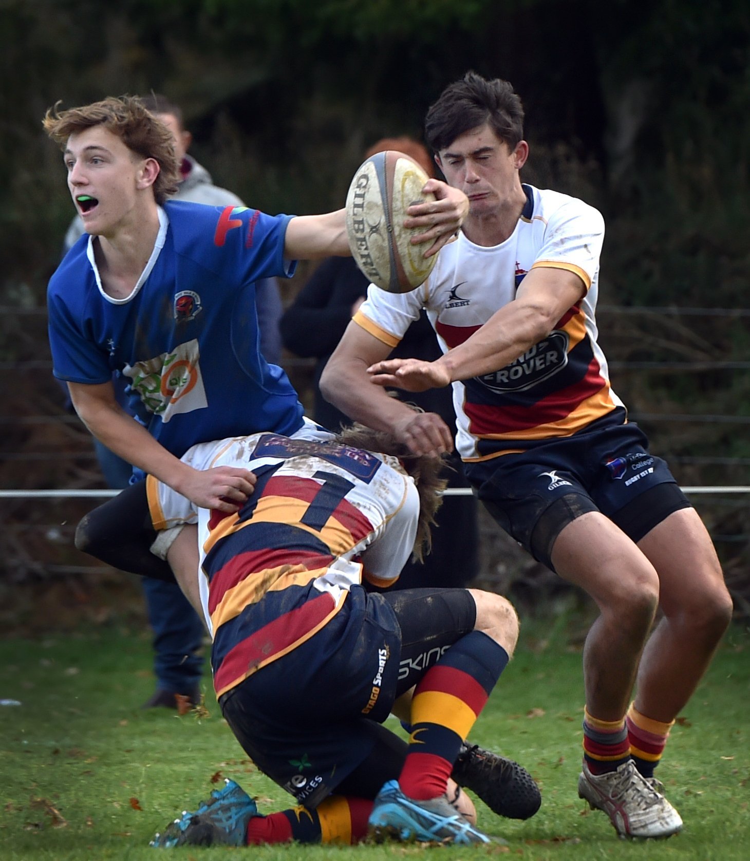 Southland Boys’ High School winger Cody Stevens is tackled by John McGlashan College winger Ethan...