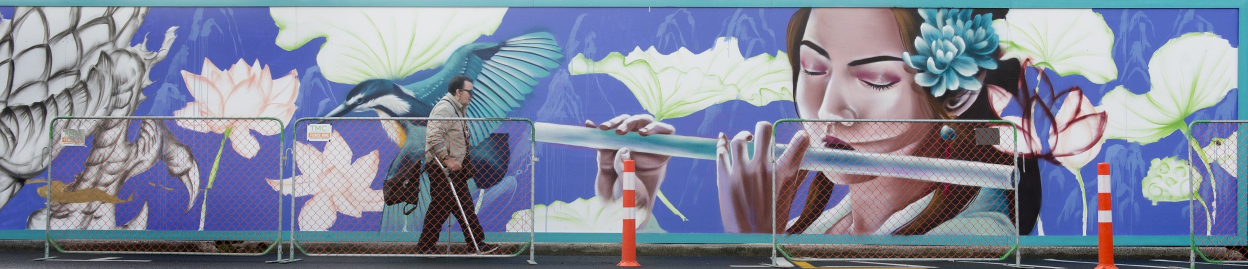 The dragon mural on the fence bordering the new South Dunedin library site in King Edward St is...