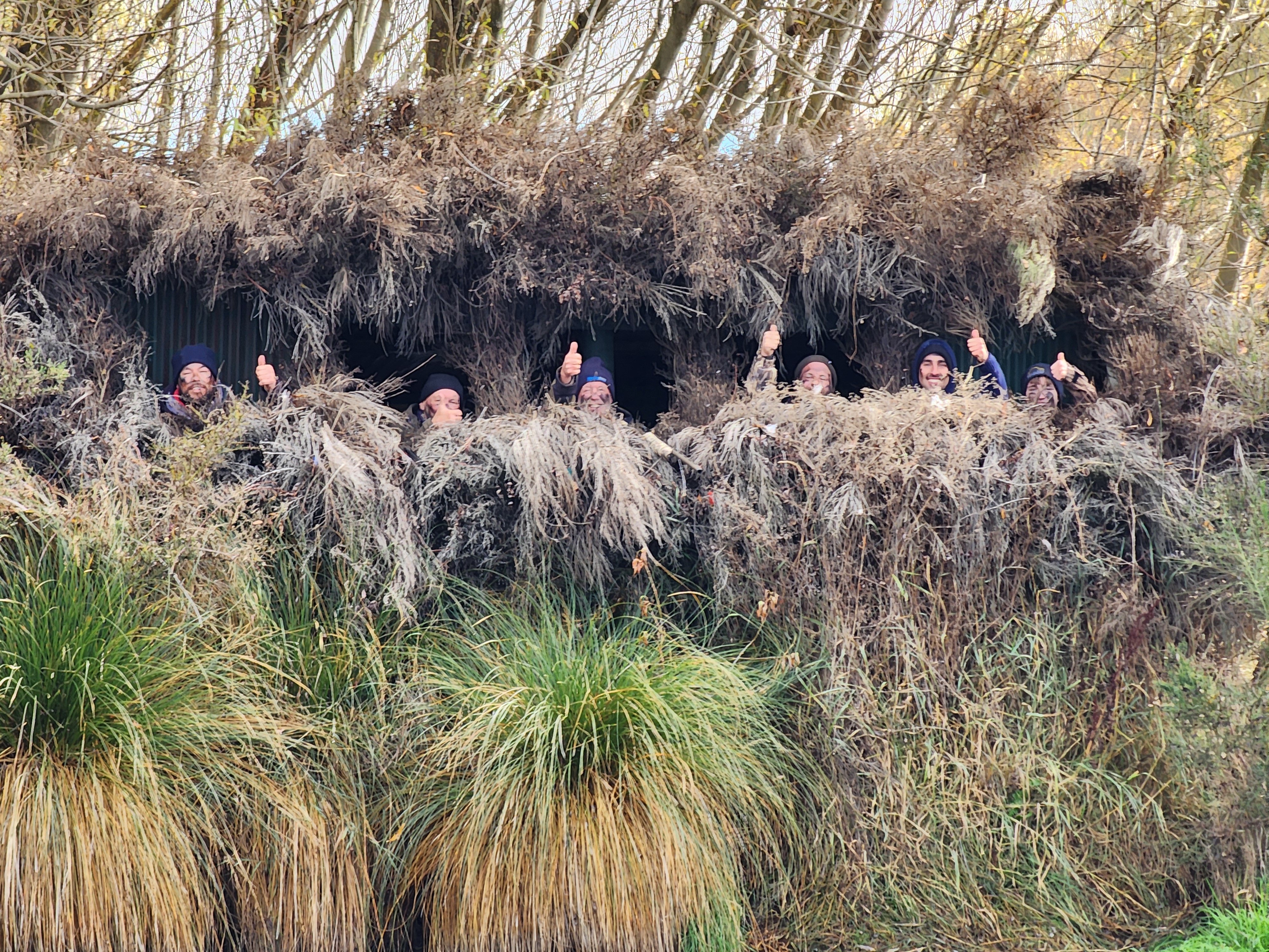 Enjoying opening day of the game bird season at a mai mai near Ranfurly are (from left) Scott...