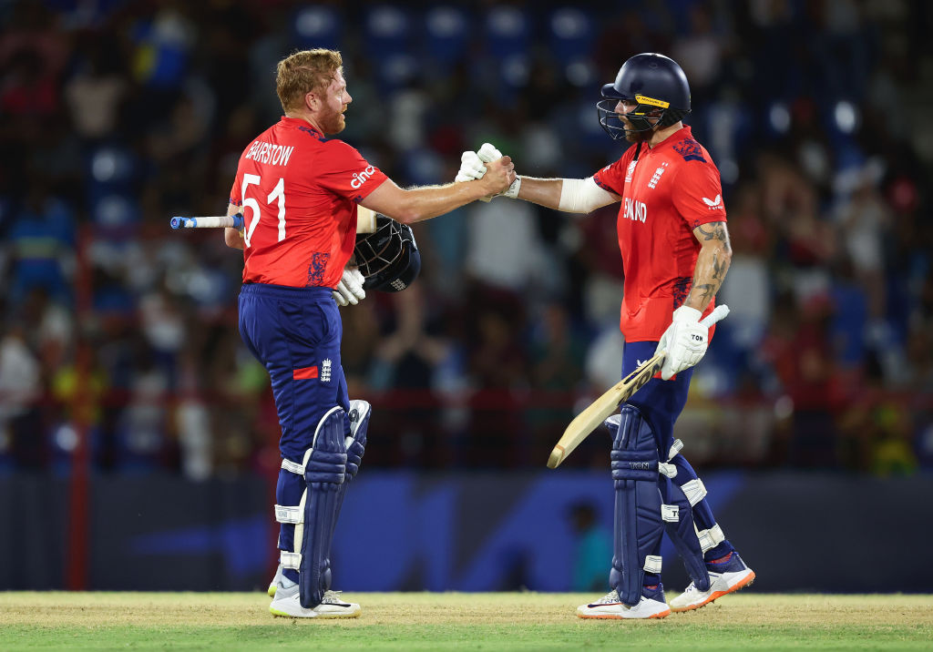England's Jonny Bairstow and Phil Salt celebrate their victory over West Indies in Gros Islet,...