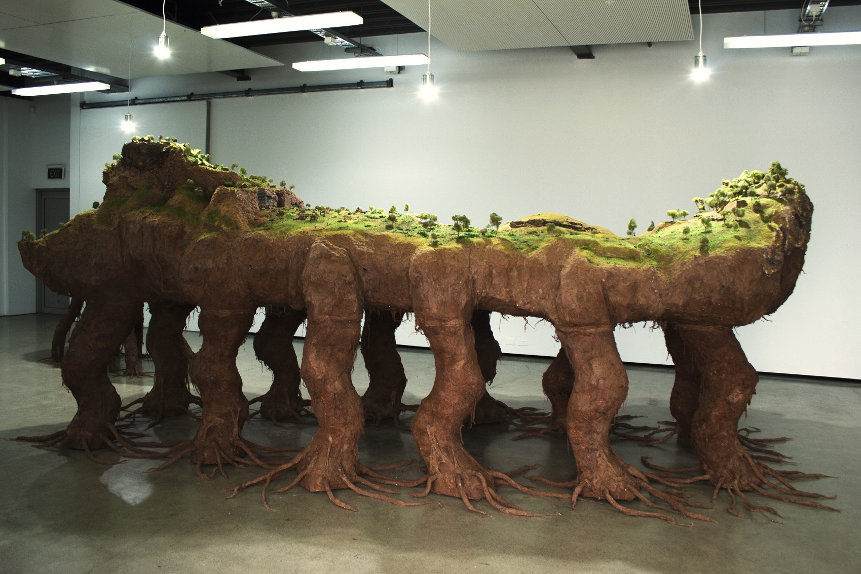 Jerry Howlett has been experimenting with extremes of scale — from the large Earthforms (above)...