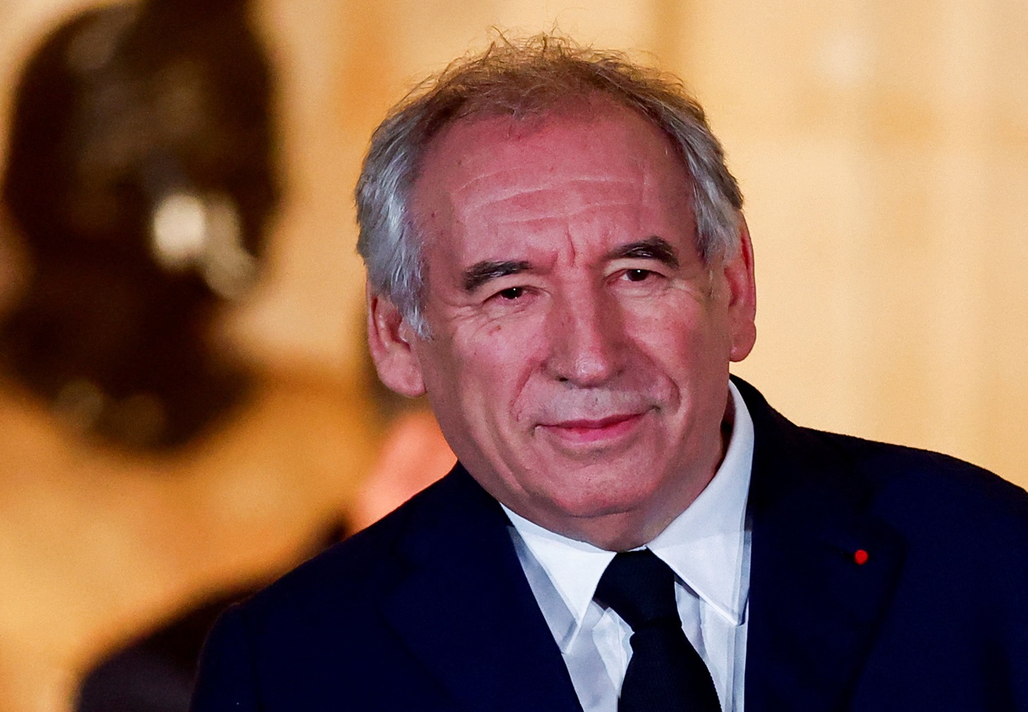 France's new Prime Minister Francois Bayrou attends the handover ceremony at the Hotel Matignon...